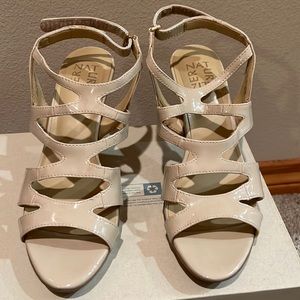 Pair of 2.5” heels, cream color. Brand New. Never worn.